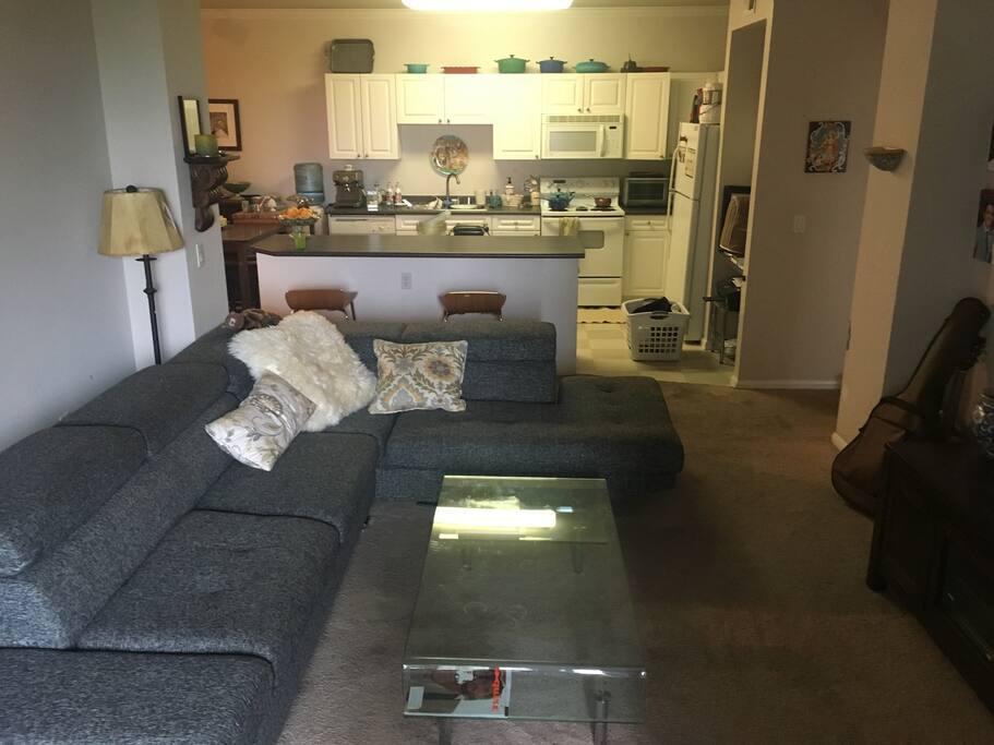 Living room looking at kitchen seated bar area