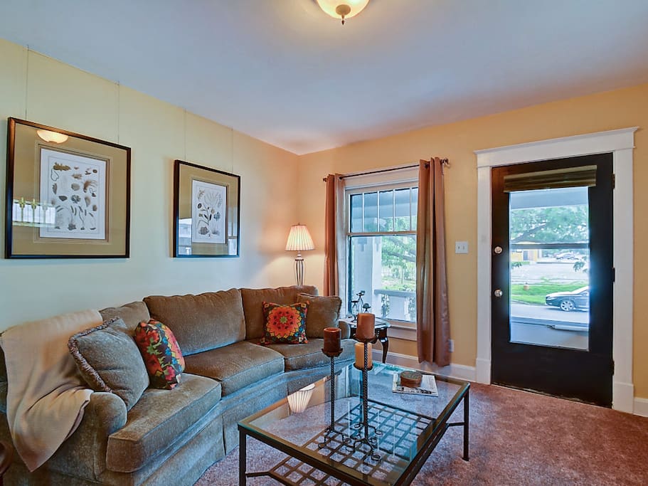 Living room with view out front porch