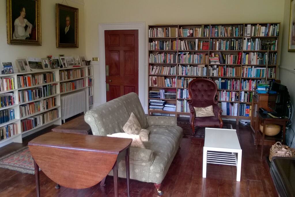 Large, comfortable sitting room (8m x 5m) with high ceilings (and with TV and XBox), giving out through French windows on to the garden.
