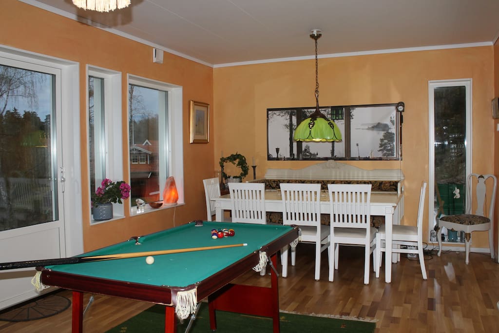 Dining room with small billiard table