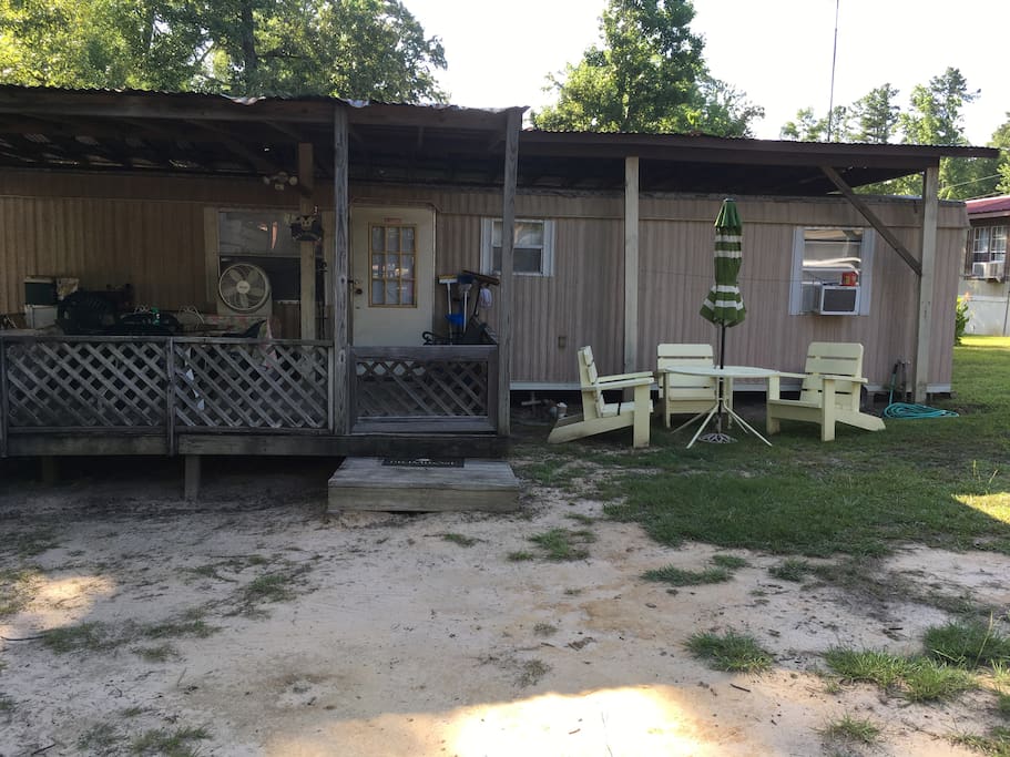 Covered front porch ,& chairs & umbrella in the yard, if you want to smoke