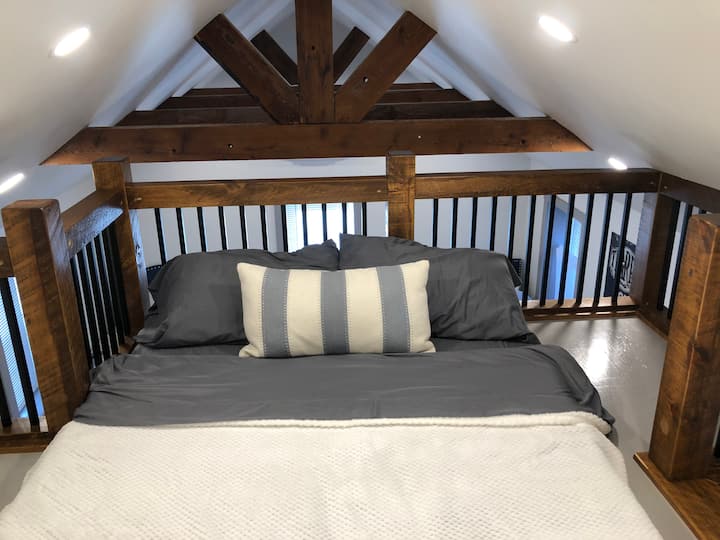 Bed in loft space. This is with bed extended.  When folded, the bed is a kids sofa.