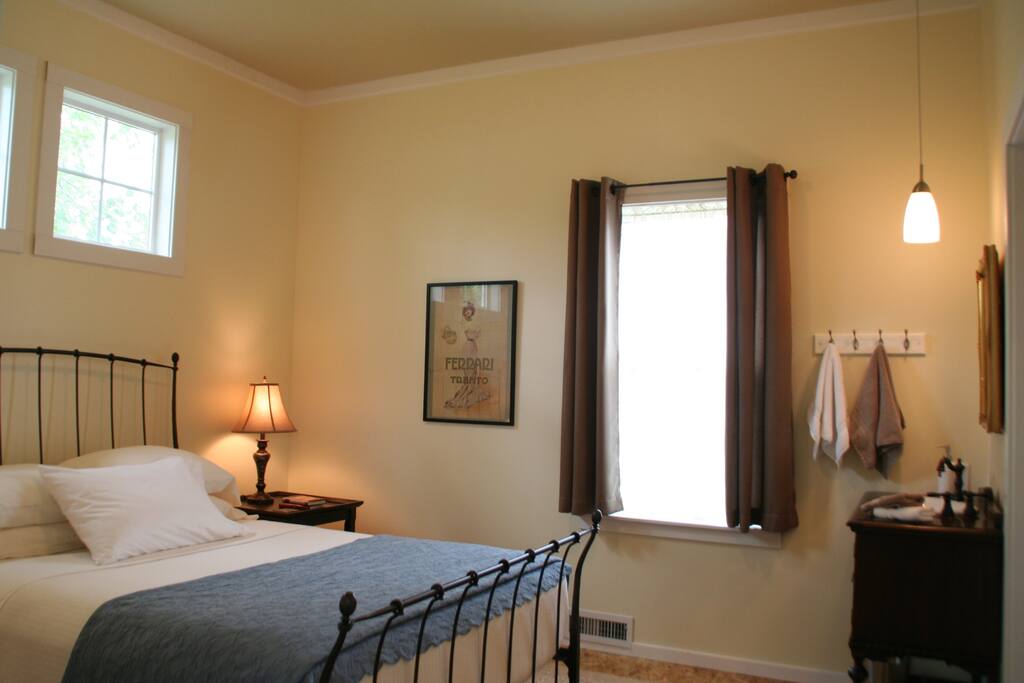One of two queen bedrooms, each with a private bath