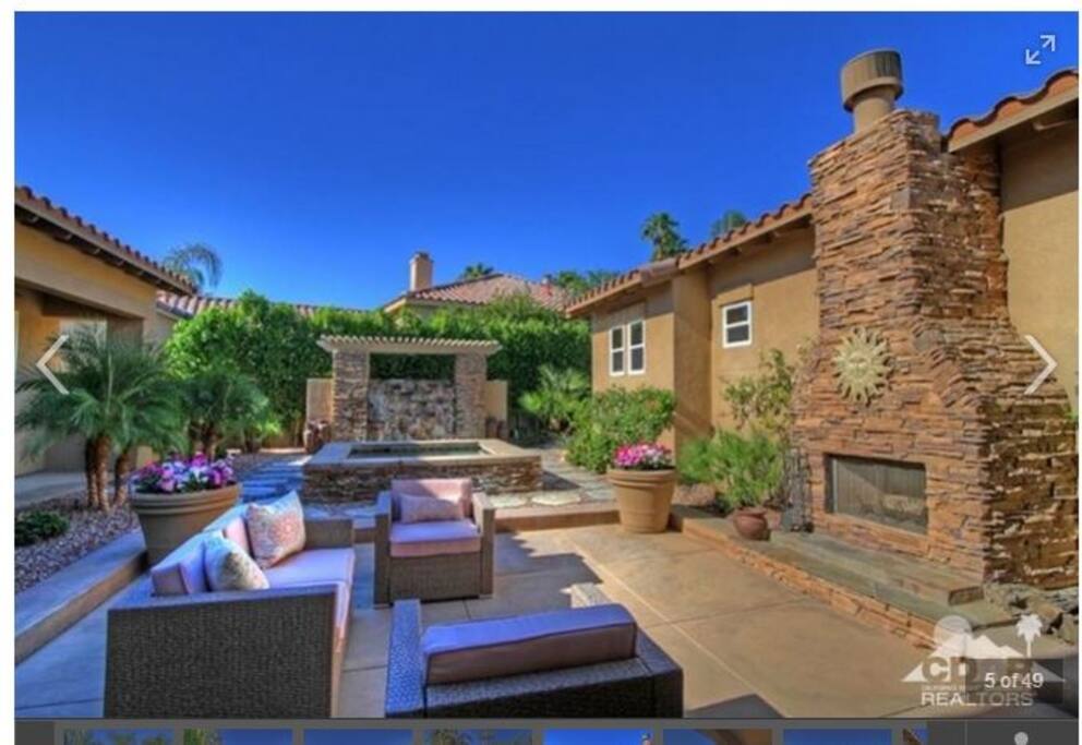 Courtyard jacuzzi, fireplace and waterfall