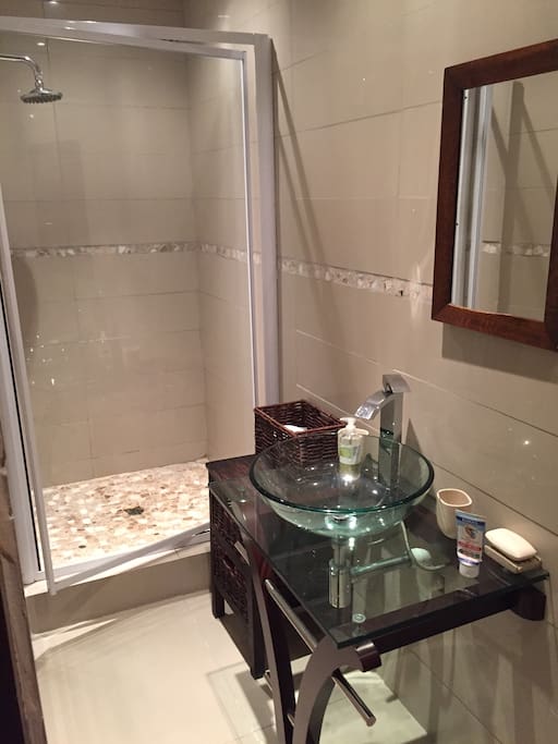 Bath Room: shower, basin and toilet.