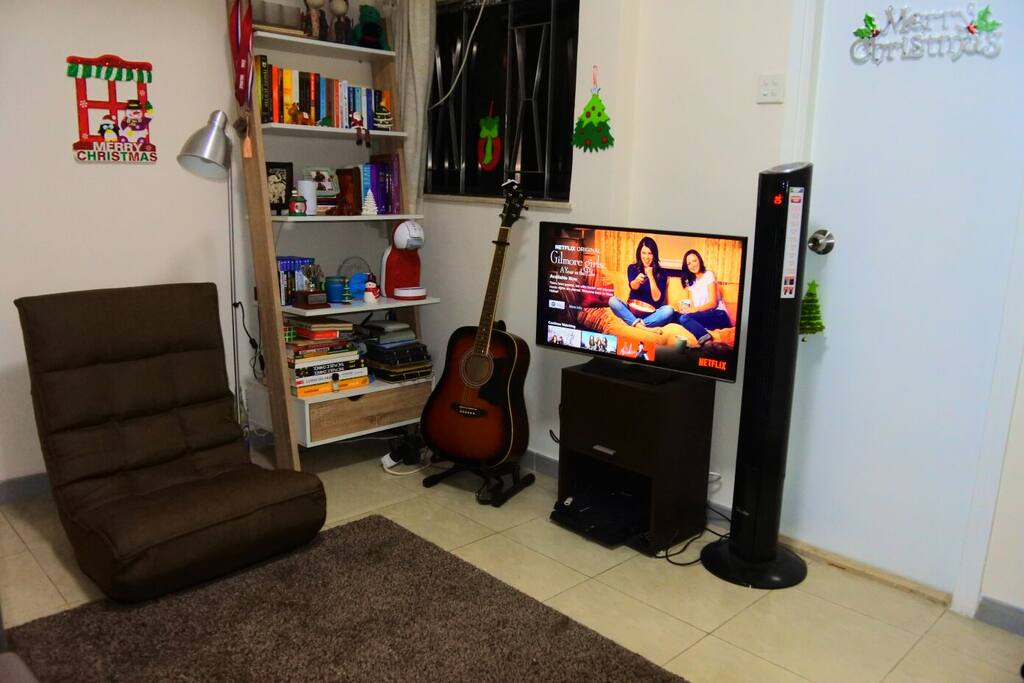 Living room with PS4 and Netflix