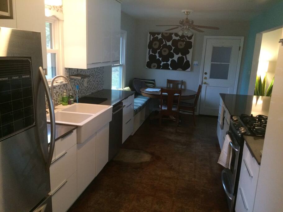 Kitchen has all stainless appliances and gas range