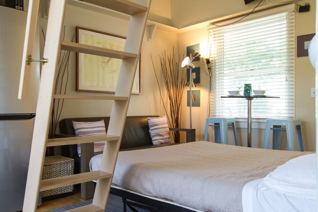 The queen size murphy bed easily comes down for a peaceful nights rest...