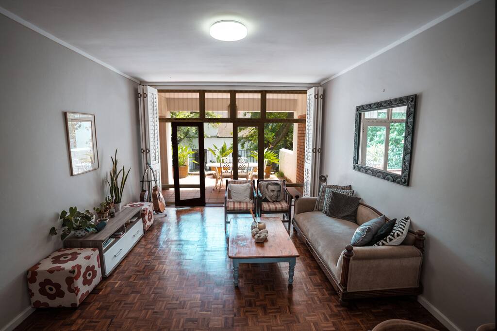 Open plan lounge with access to large balcony