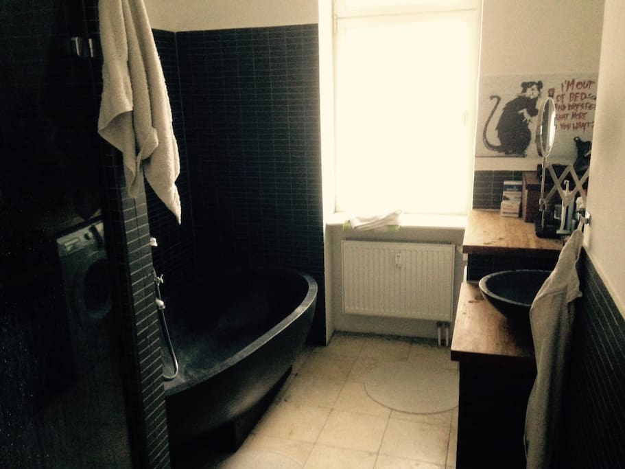 bathroom with bathtub.