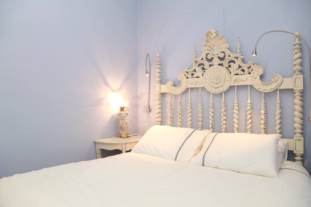 Recycled headboard and bedside lamp