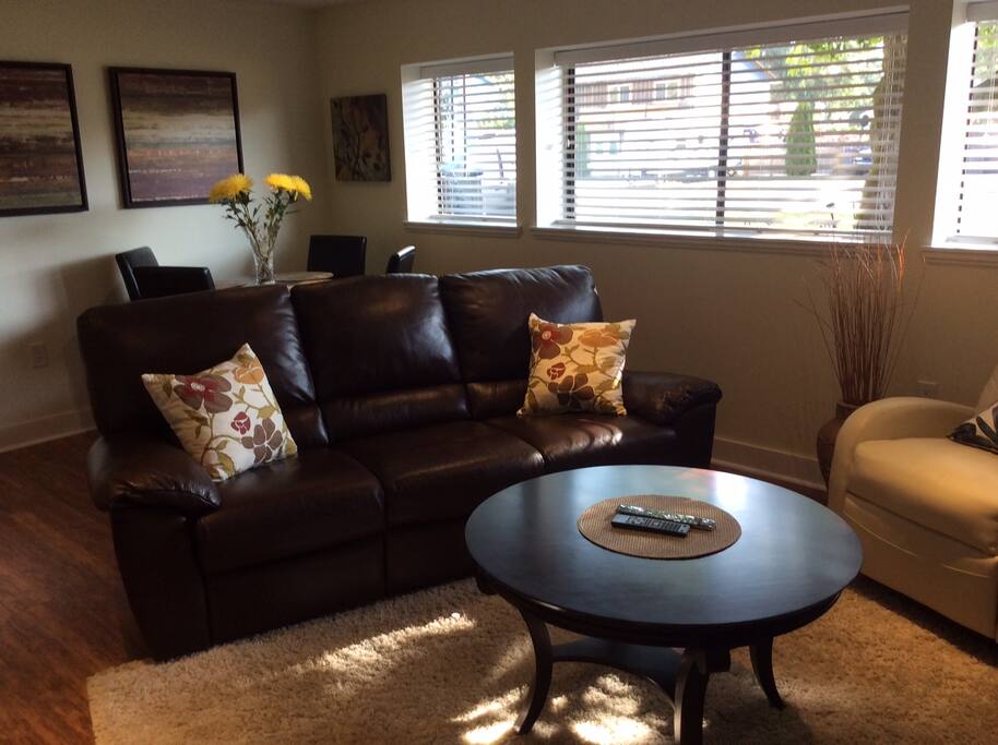 Lots of windows making for bright living room and diningroom areas.