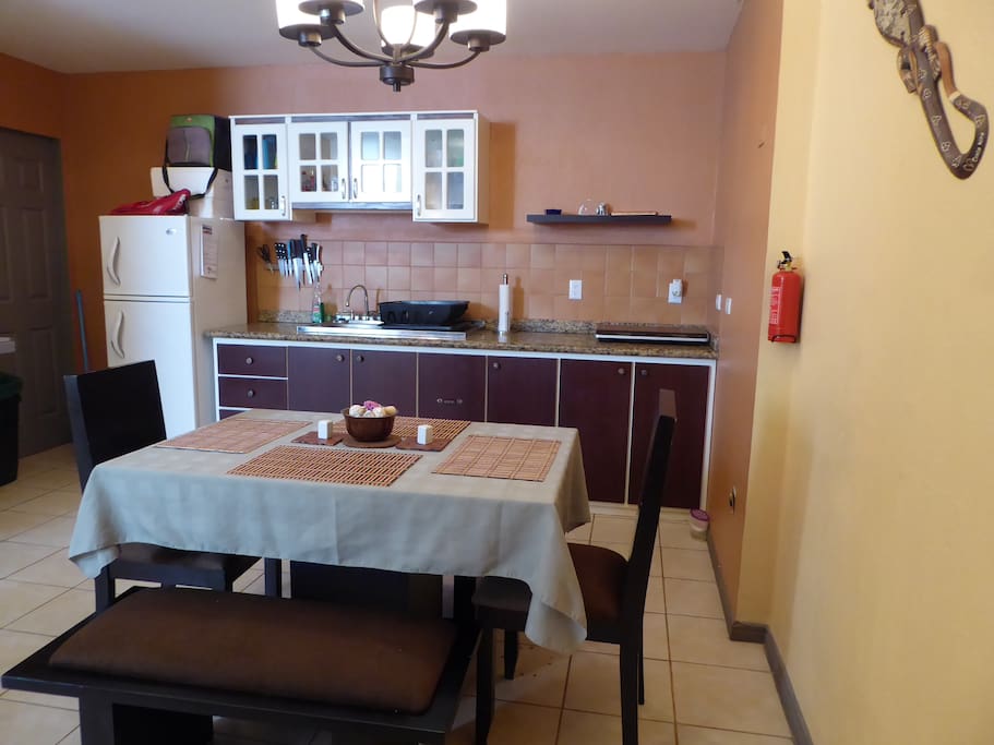 Freshly Painted Kitchen with Everything You Need to Make and Enjoy a Good Meal