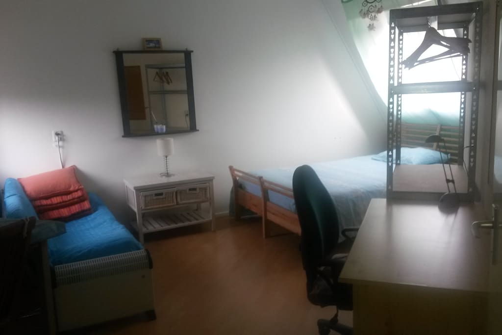 Comfortable couch, desk with chair