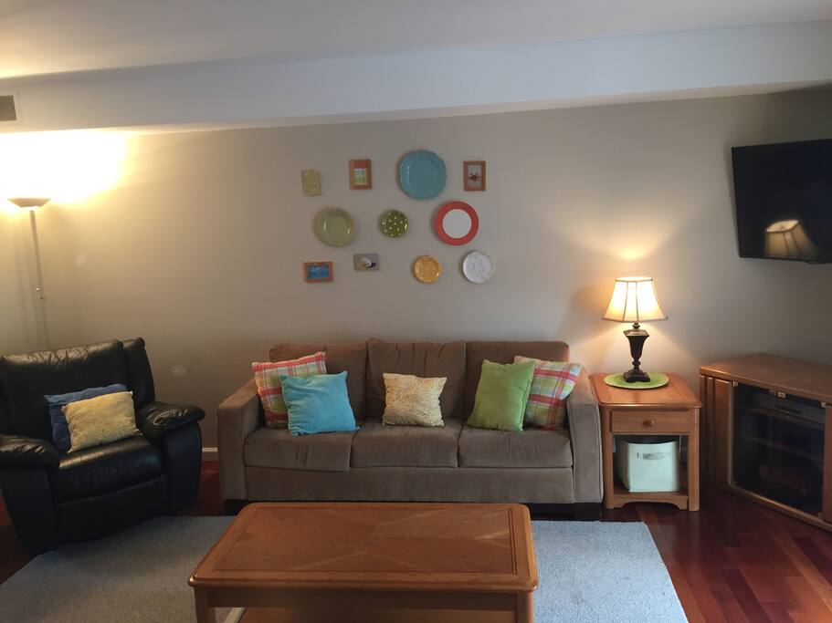 Living room showing rocker/recliner and sofa bed