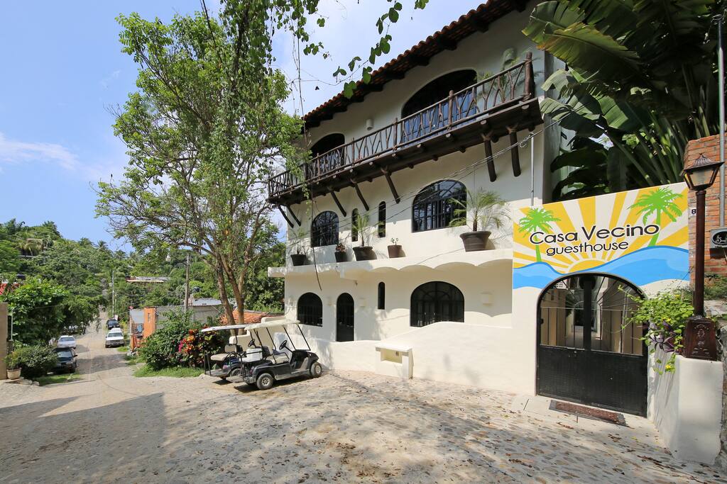Entrance of Casa Vecino. Our entrance features a secure coded door look and lots of outdoor lighting to help you find your way