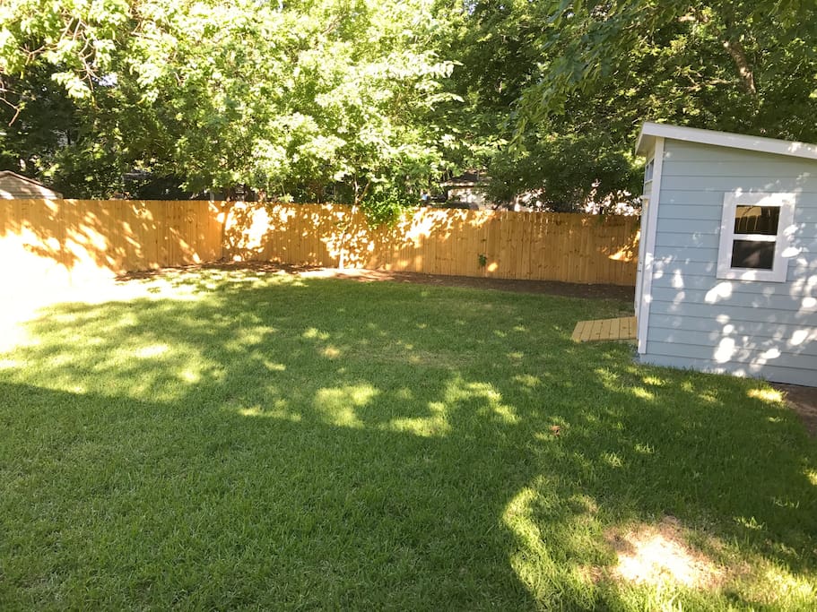 Here's the backyard with my beautiful shed. Completely fenced in and super comfortable to hang out in.