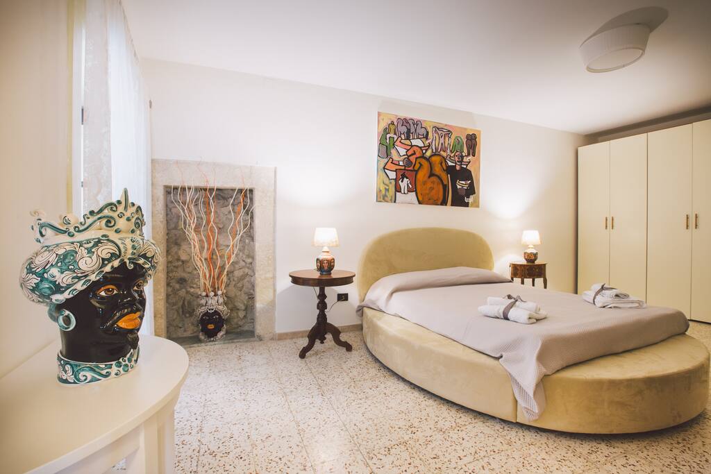 Bedroom with a comfortable round bed