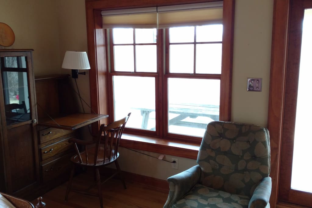 Private porch access overlooking the Milwaukee River Greenway.