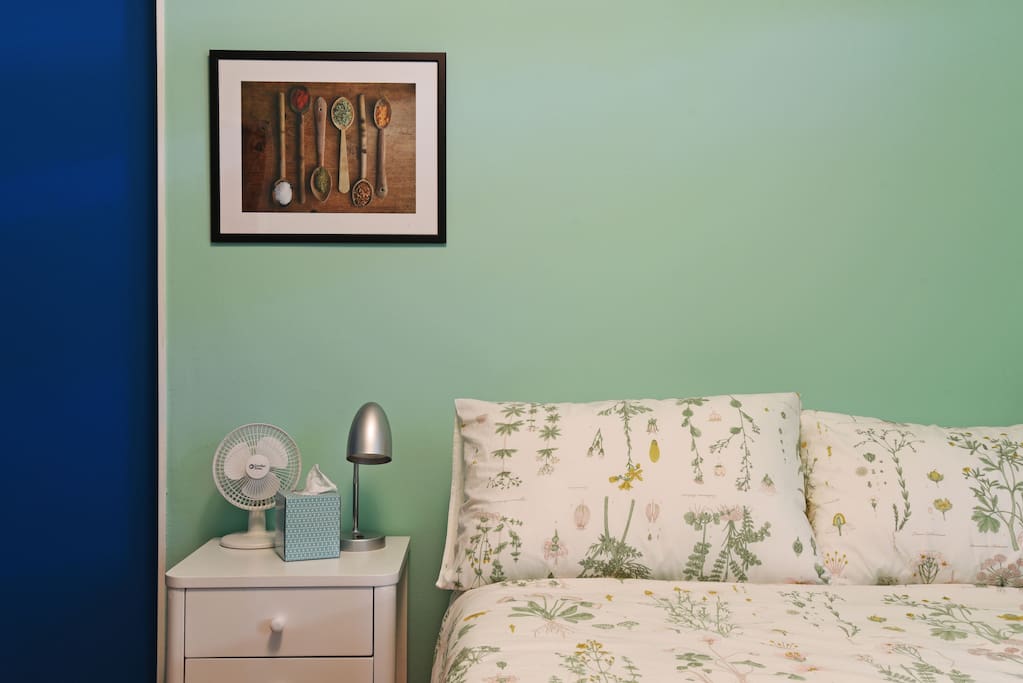 The green room with new double bed. Side tables with lamps on both sides.