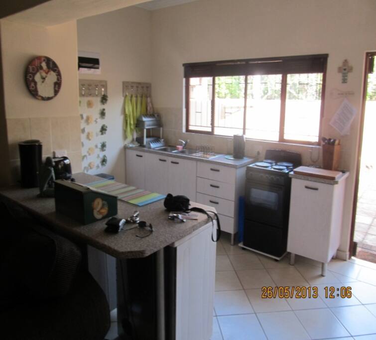 Spacious open plan kitchen with all cutlery, crockery etc.