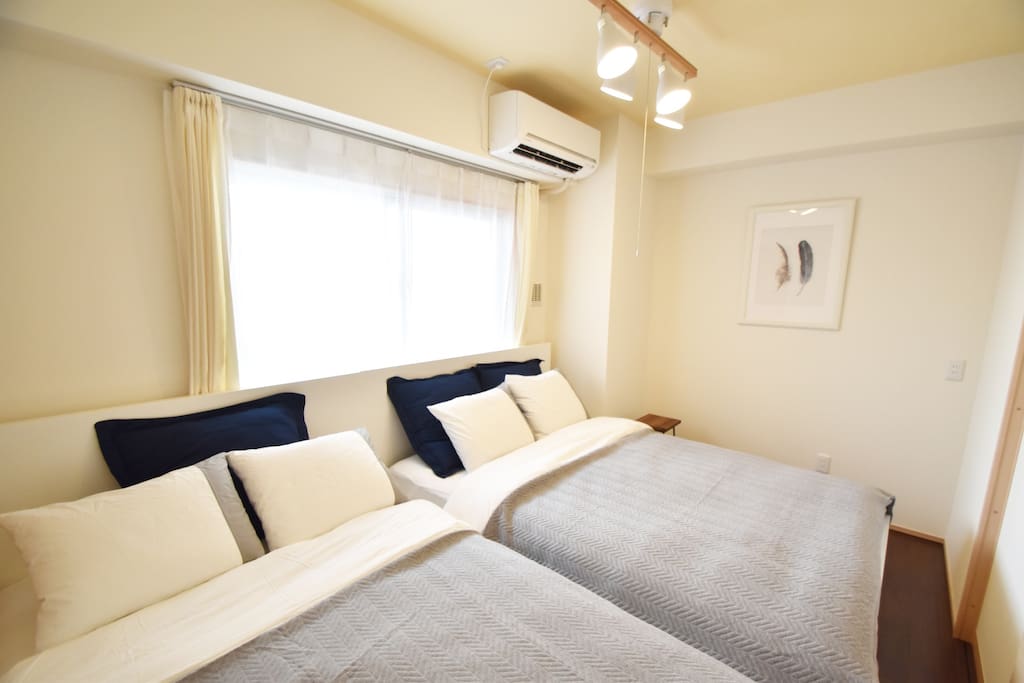 Two of double sized beds in the bed room.