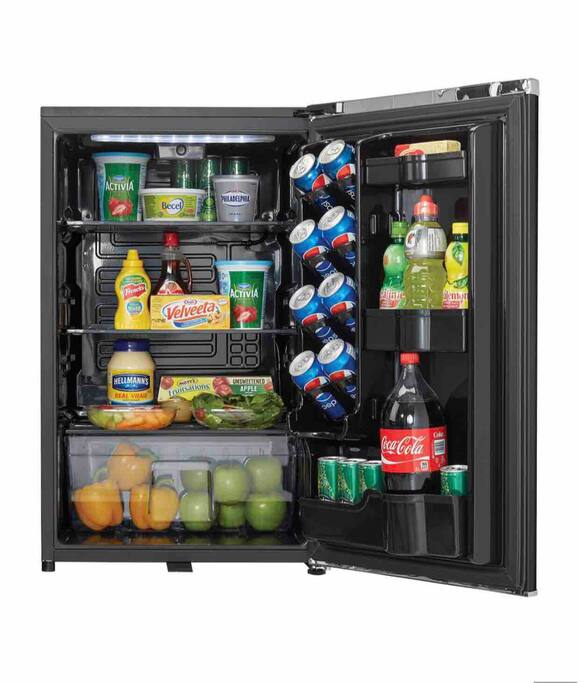 Items in photo are only photo props. The items give guest example of space for their personal cold storage needs.