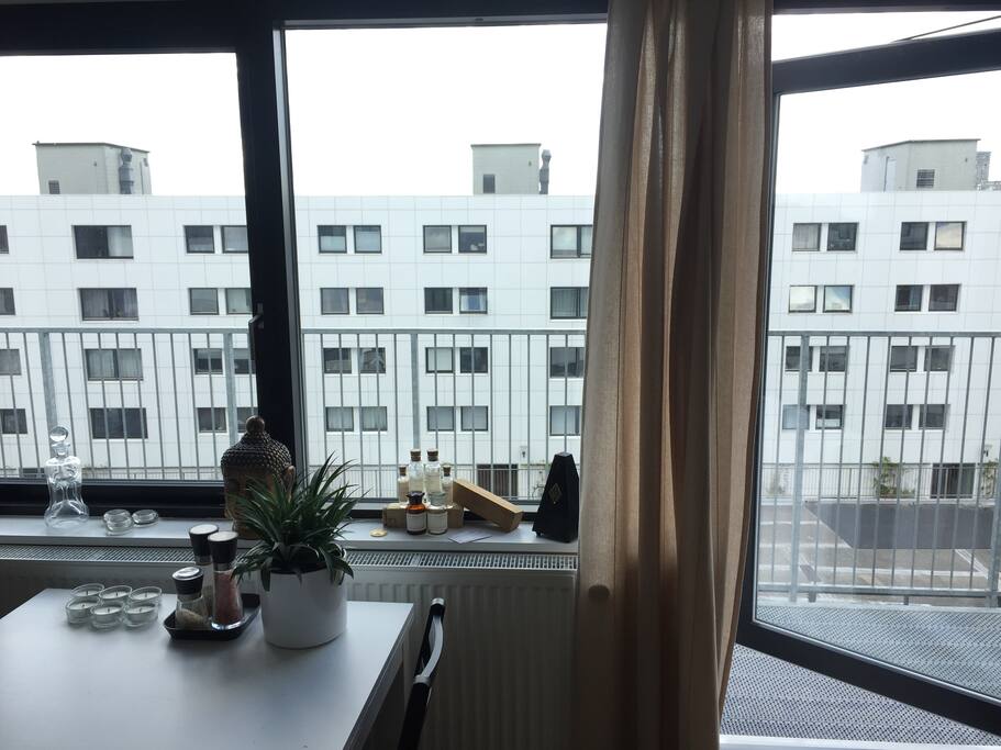 Livingroom with door to shared (thin) balcony