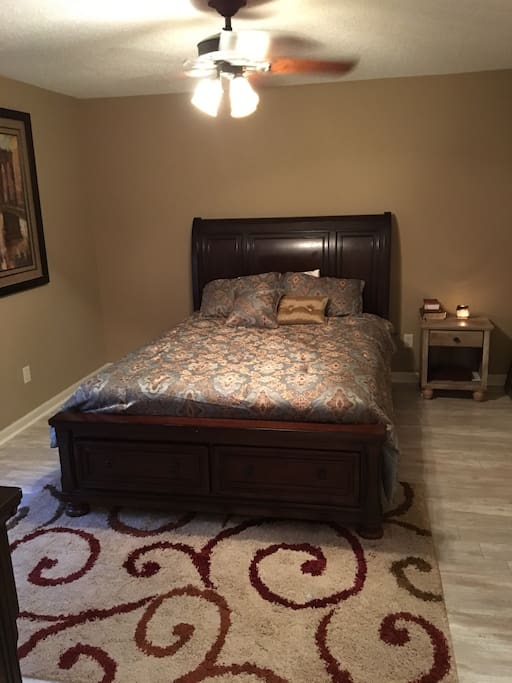 Master bedroom with adjacent bathroom. Queen size.