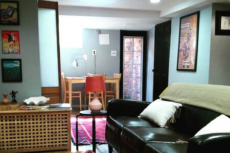 Art-Filled English Basement in Fun Neighborhood!