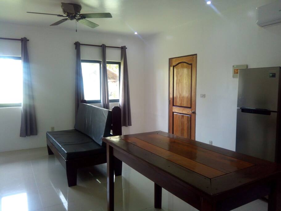 sleeper couch, Front door, living room.
