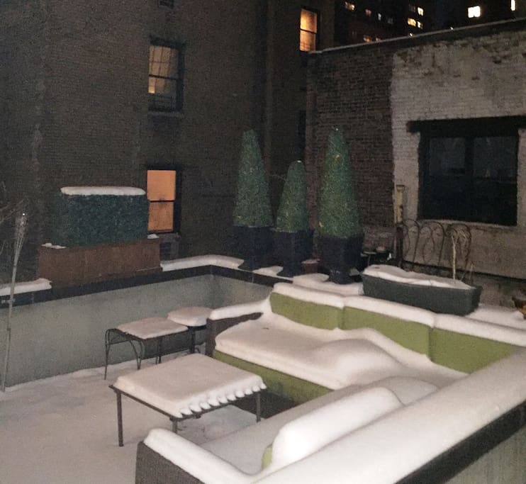 Large private outdoor terrace for this apt. only. On the 3rd floor with large outdoor sofa, table, and chairs.