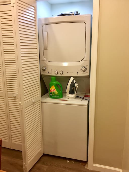 Wash your clothes in the washer and dryer with detergent provided. Also available is an iron and small ironing board.