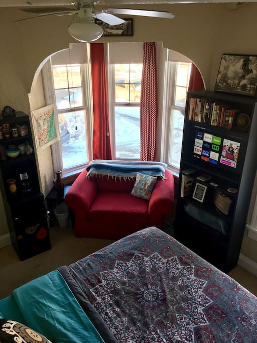 Additional features of the private room include: Couch and huge bay windows; Smart Roku-connected TV with access to programming on Hulu, Netflix, Amazon Video, and multiple cable networks; and coffee & tea bar.