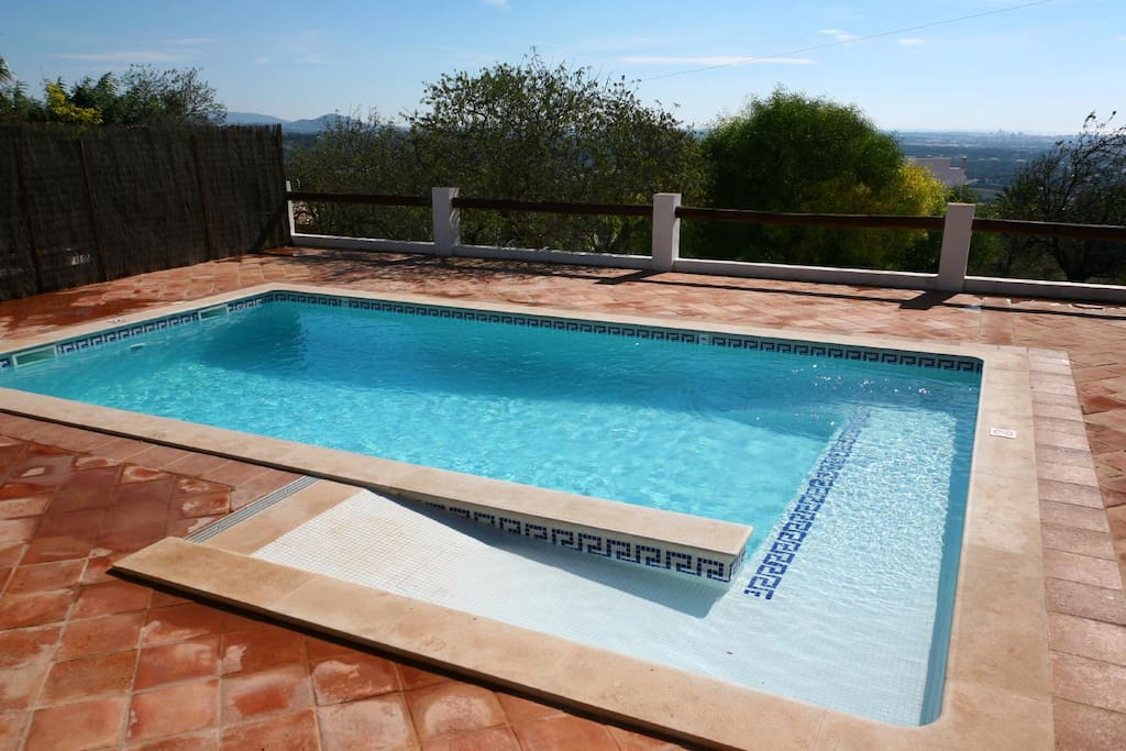 Ramped swimming pool