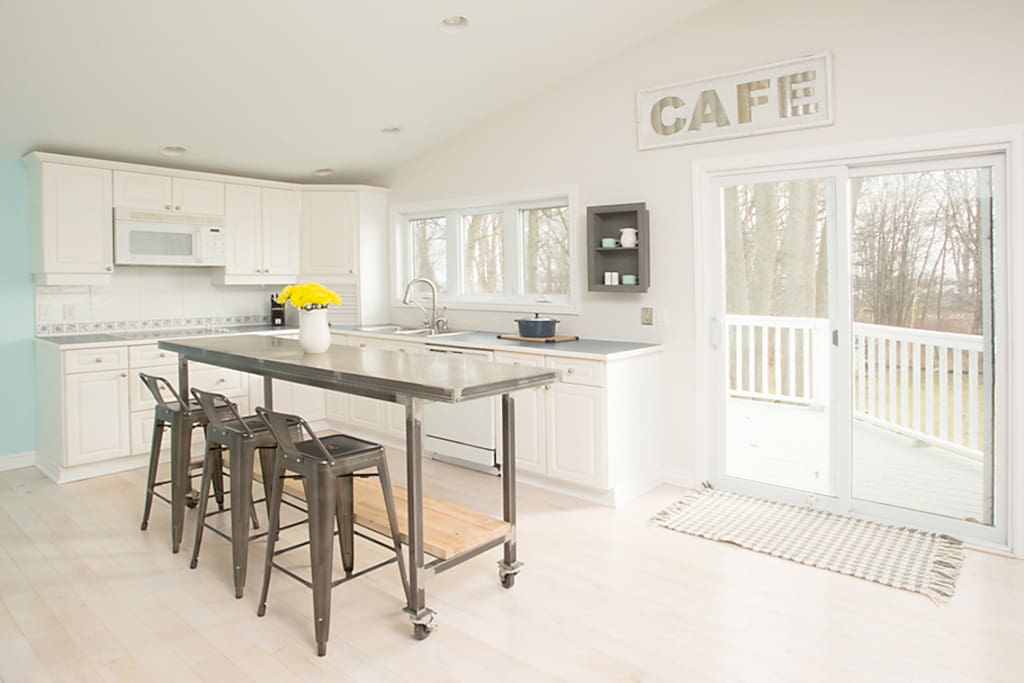 Main House: Large, fully stocked kitchen with walkout to Upper Deck