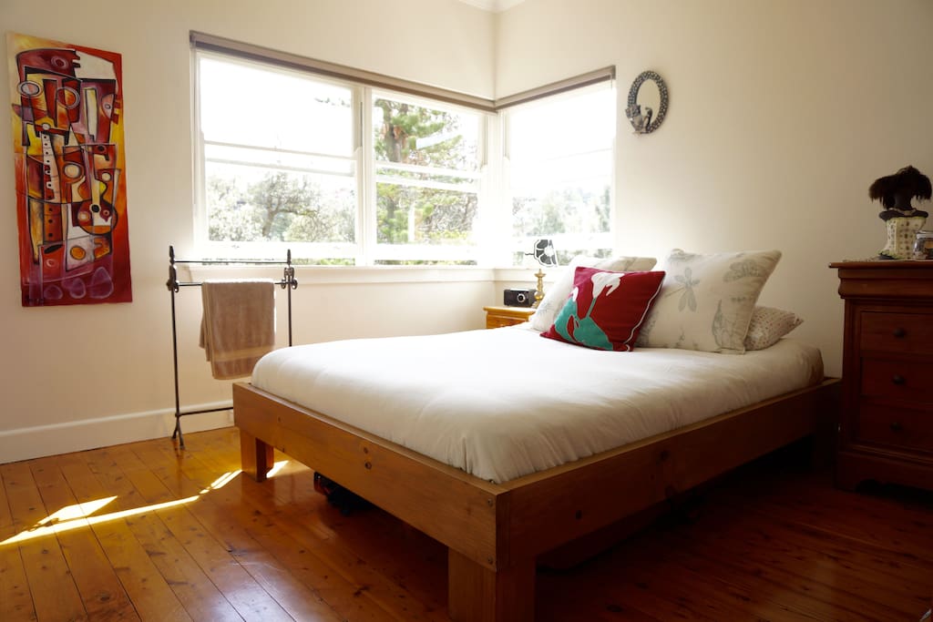 Main: Bright and beautiful mornings. Super comfortable queen size bed and latex mattress. Nights are quiet and dark with parkland backdrop and blackout blinds.