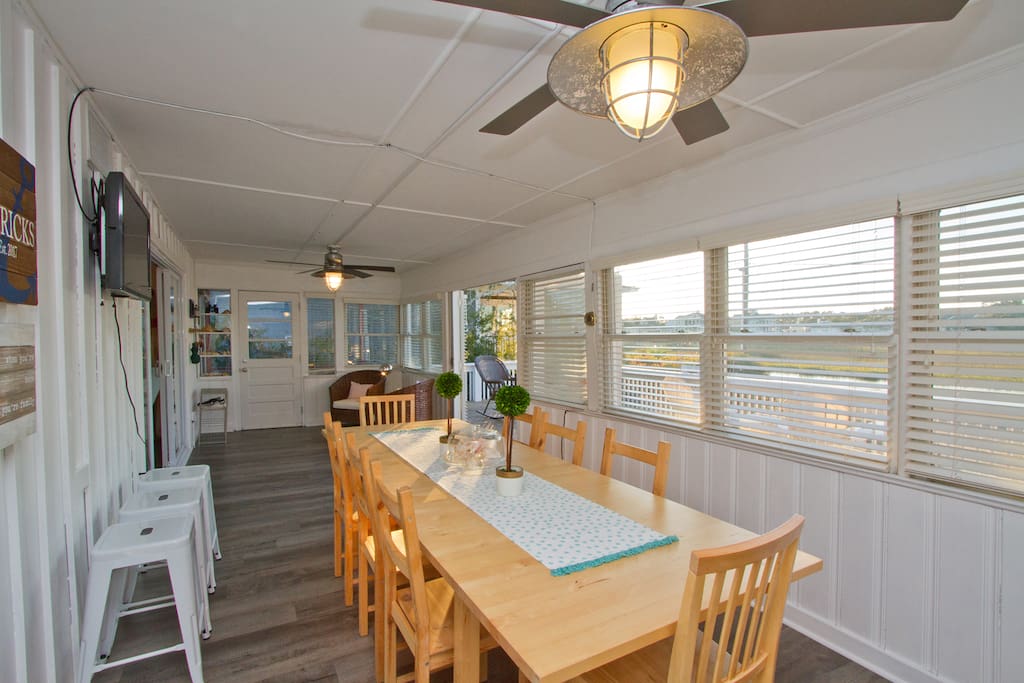 Large family-friendly eating area on the front porch.
