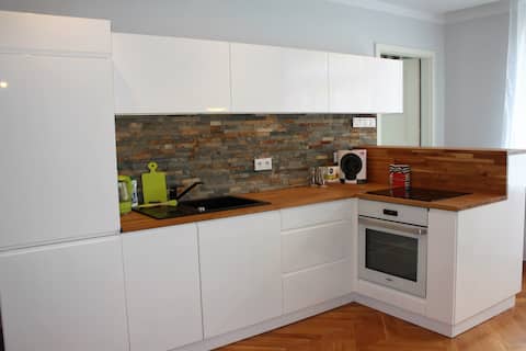 an apartment with a separate bedroom in a super location