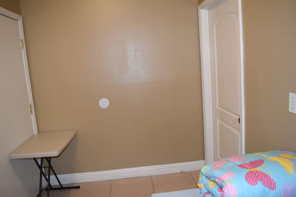 small room with door and lock