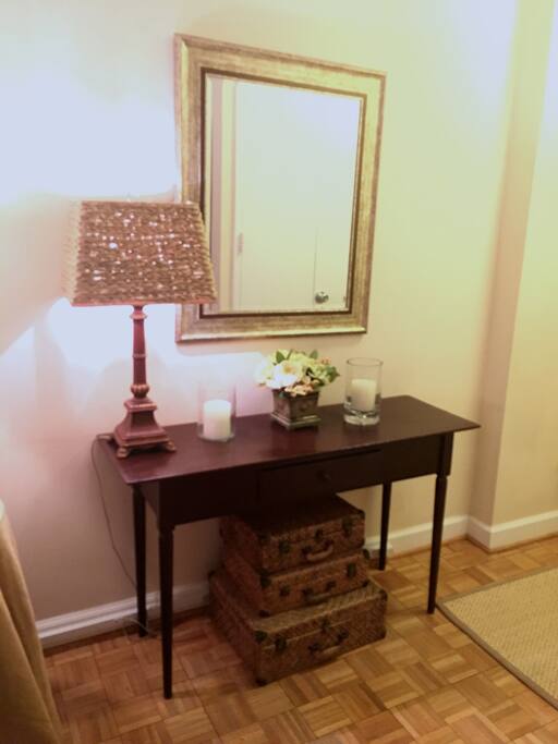 Entry Hall Way with large coat closet and hanging rack for visitors with ready to use, clothing steamer.
