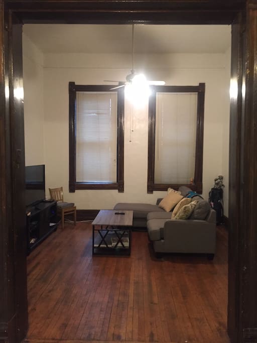 Looking at the living room through the kitchen - vintage framing between the two rooms