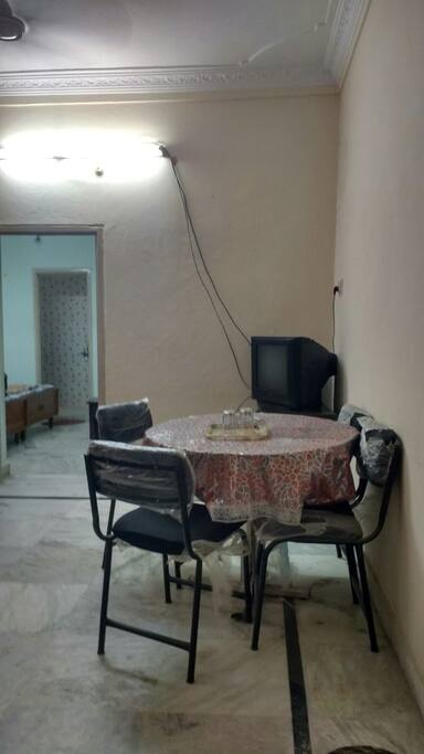 Dining area and T.V in hall
