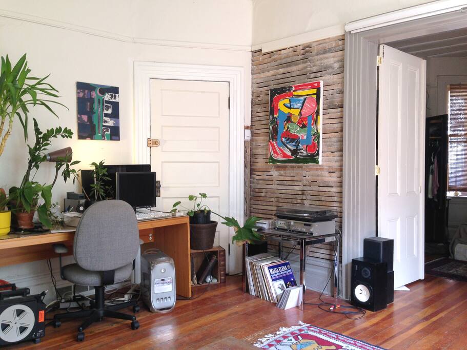 This is our rustic wall and desk zone. The rustic wall features a painting by a local artist, if you can believe that.