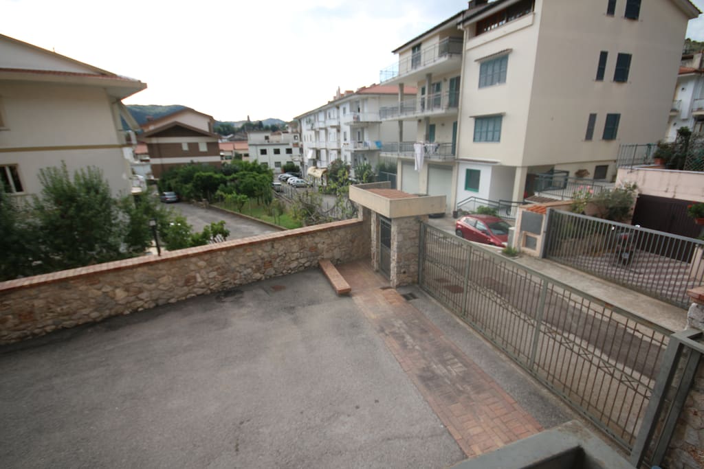 View of street (Deli, school, gym and Doctors) from balcony.