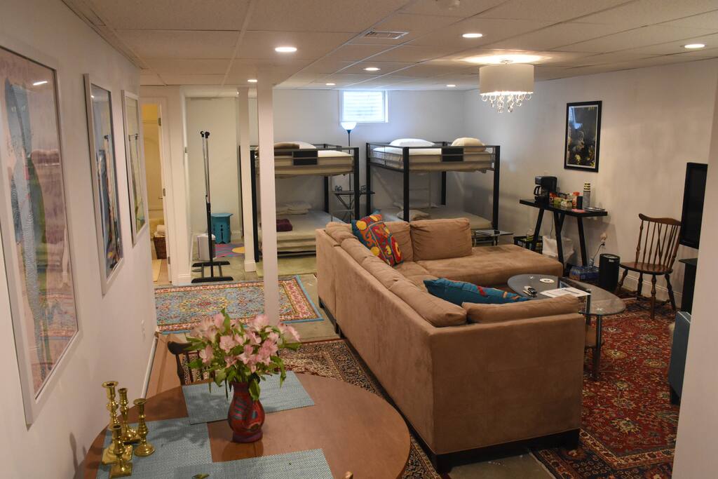 Common area with 4 full-size Beds, and Full bath
