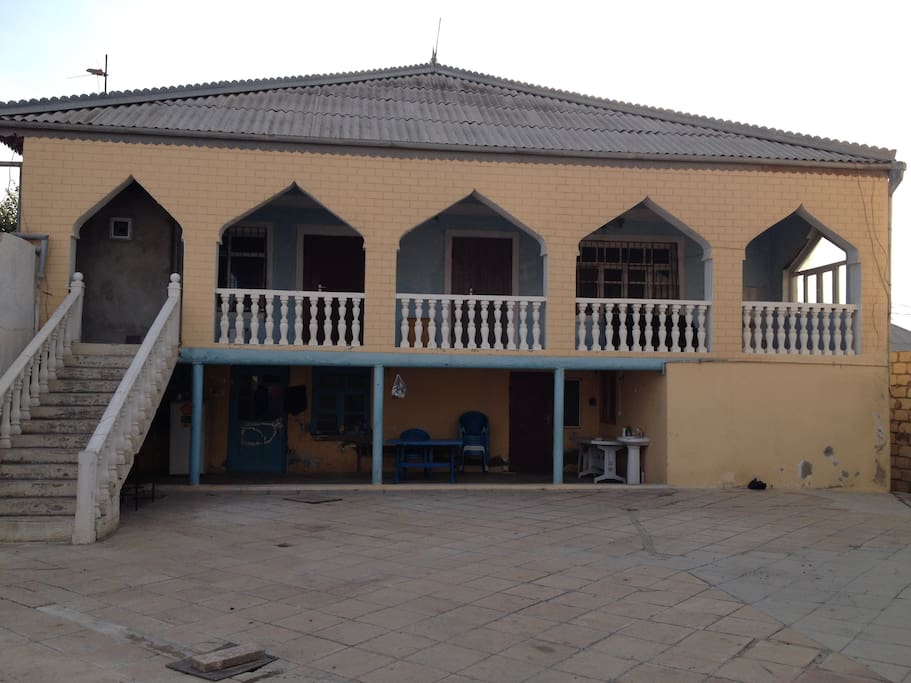 Two floor building with large front yard
