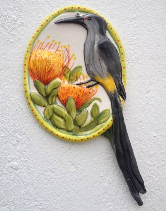 Sugarbird motif at the entrance to our apartment
