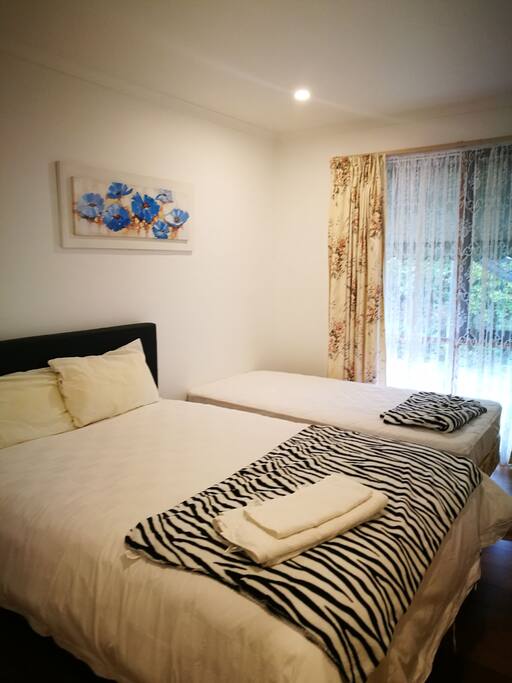 one double bed , one safe bed, for three people