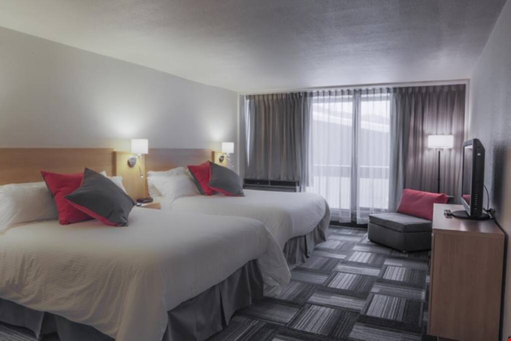 Sink to sleep in one of the two comfortable queen beds.